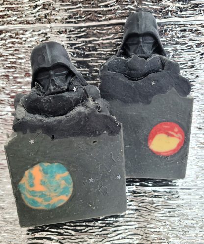 Darth Vader soap helmet over galaxy and planet themed soap